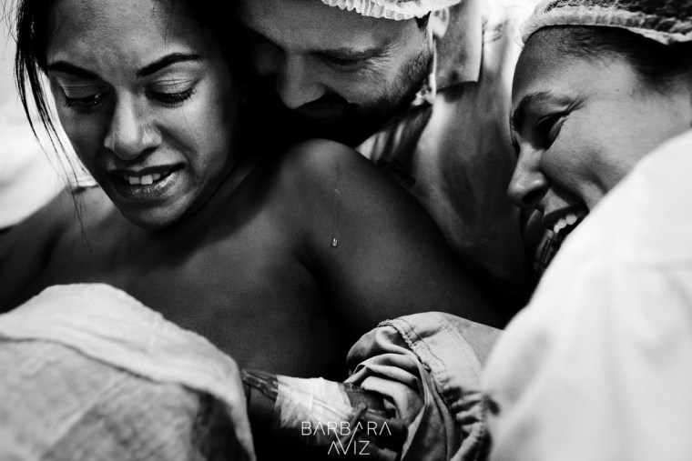 In her award-winning image, Brazilian photographer Barbara Aviz captured the moment when a father shed tears at the sight of his newborn daughter.