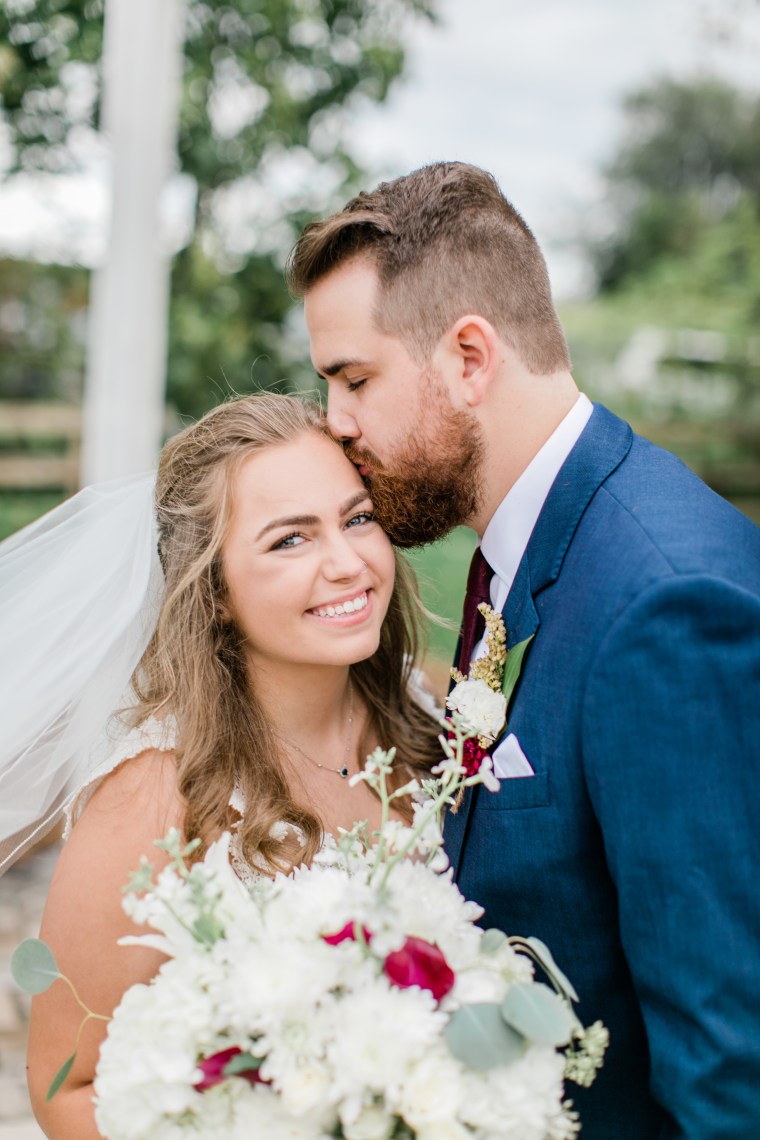 Dean with her husband, Justin, on their wedding day in October 2019.