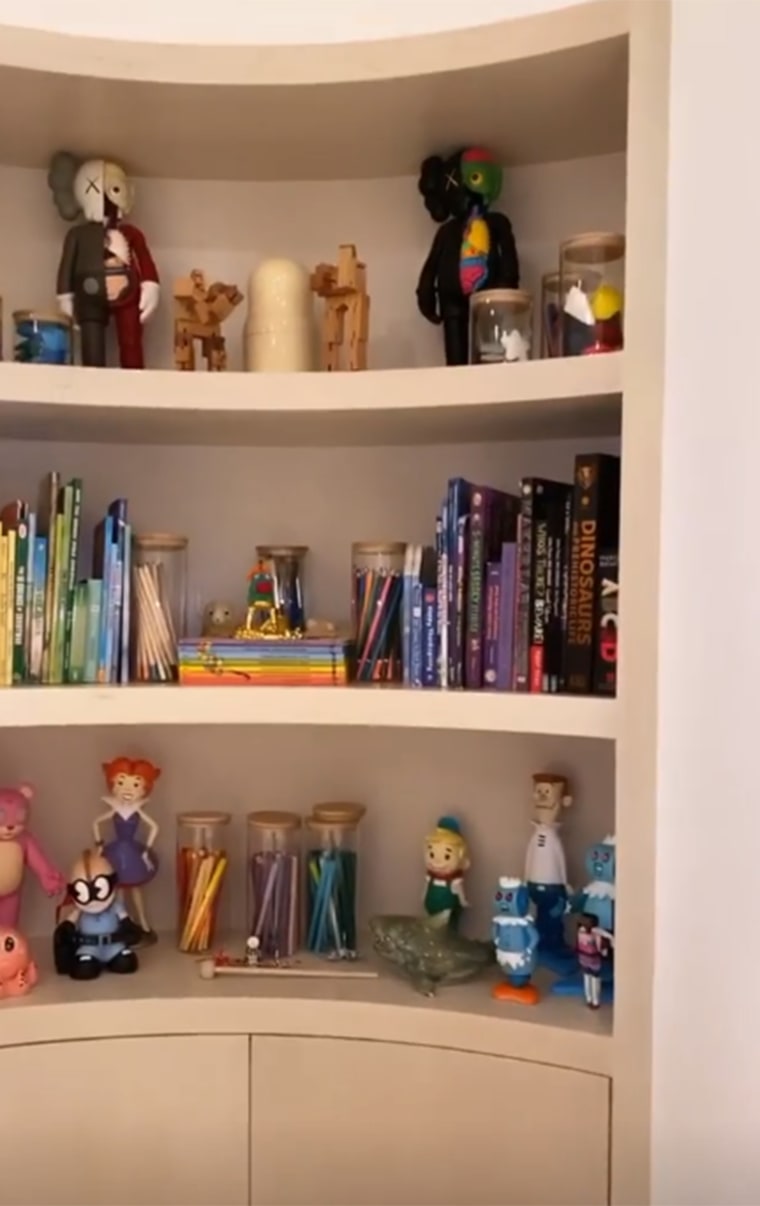 A shelf where all the "educational stuff" is kept.
