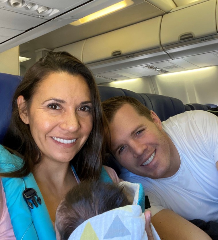 Dustin and Caren Moore recently took a Southwest Airlines flight home after picking up their adopted newborn daughter.