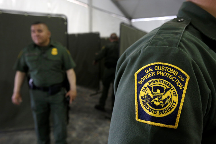 Image: Border Patrol agents are seen during a tour of U.S. Customs and Border Protection (CBP) temporary holding facilities in El Paso