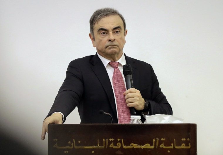 Image: Former Renault-Nissan boss Carlos Ghosn addresses a large crowd of journalists on his reasons for dodging trial in Japan where he is accused of financial misconduct, at the Lebanese Press Syndicate in Beirut