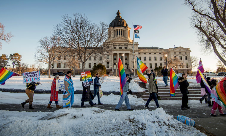 Image: LGBTQ advocates protest outside of the South Dakota Capitol before a bill banning gender-affirming care for trans youth was blocked.