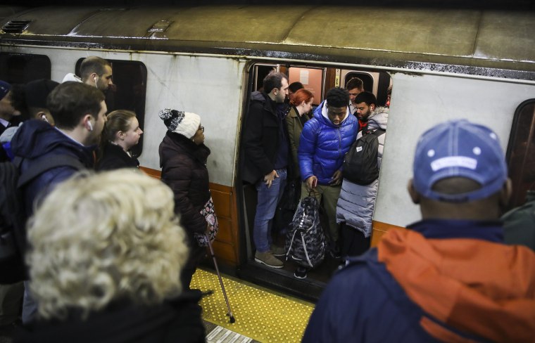 IMAGE: Morning commuters in Boston