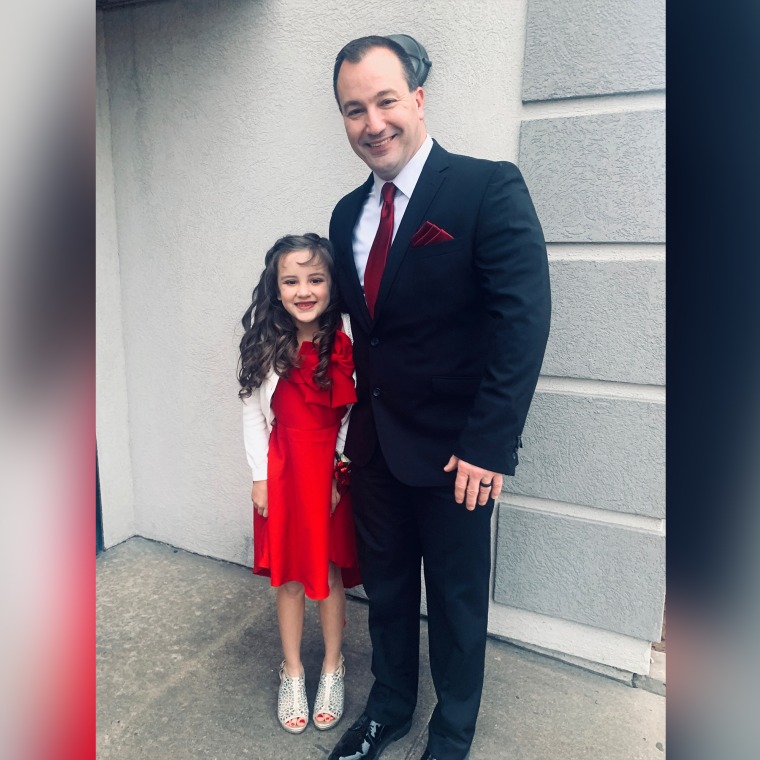 Harvey and Cox at the father-daughter dance on Feb. 10.