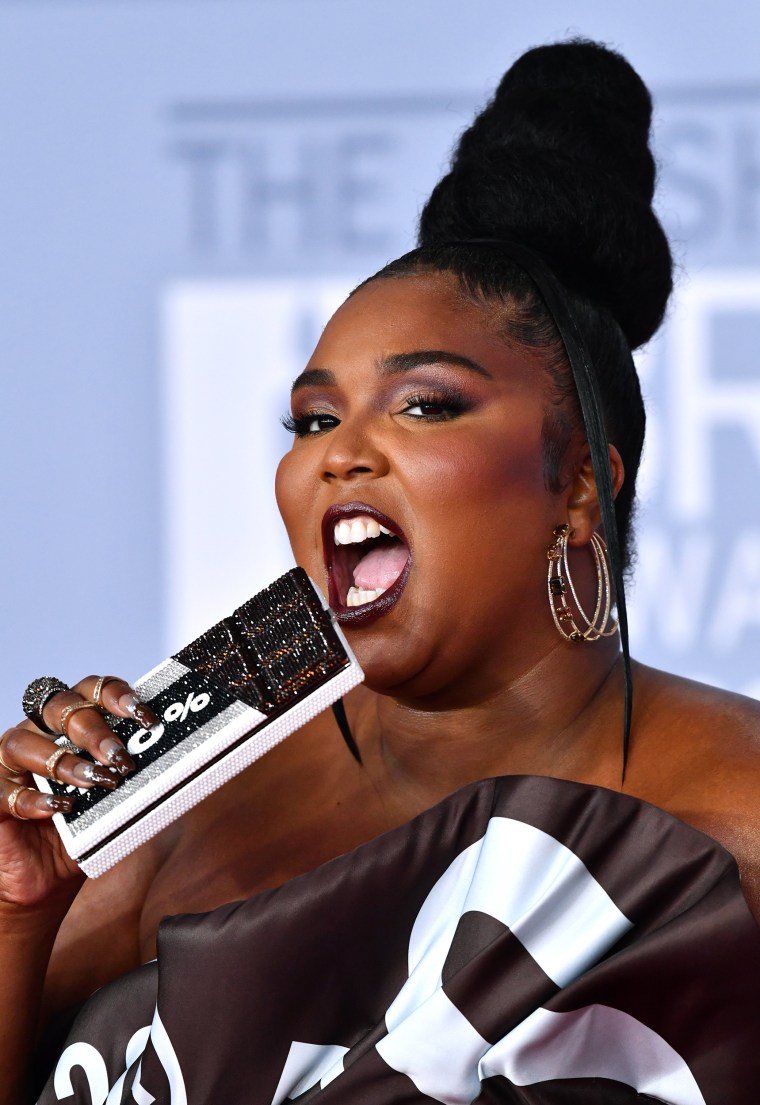 Lizzo At BRIT Awards 2020: Hershey's Chocolate Dress – Hollywood Life