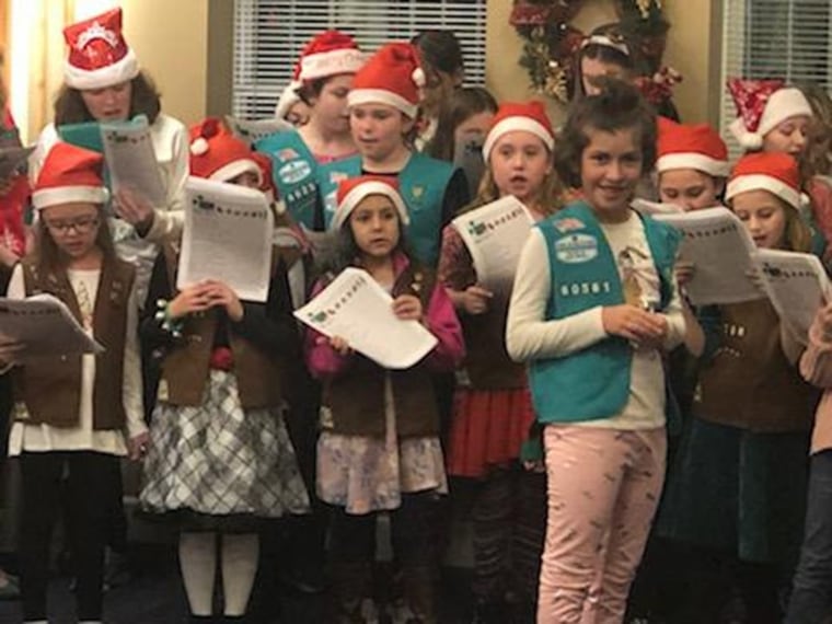Troop leaders of 60561 make sure everyone feels included no matter their ability level. When they went caroling, girls who are nonverbal enjoyed playing instruments. 
