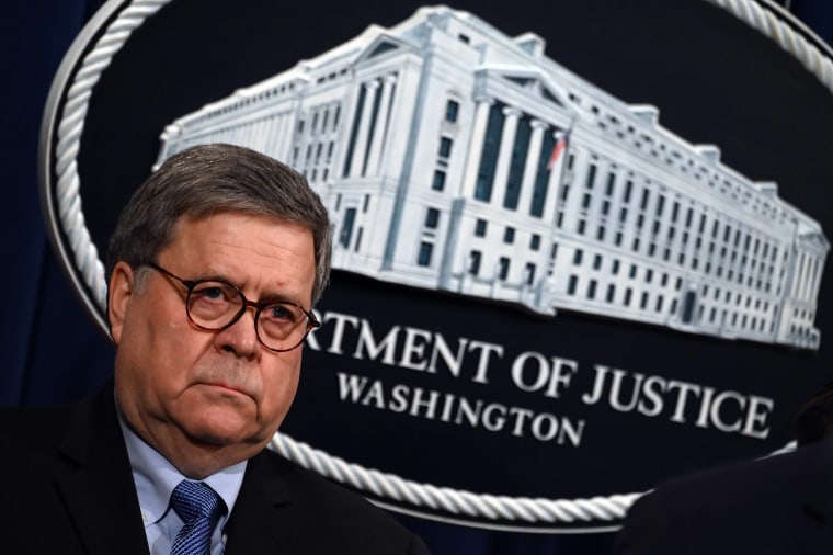 Image: Attorney General William Barr holds a press conference rat the Department of Justice in Washington