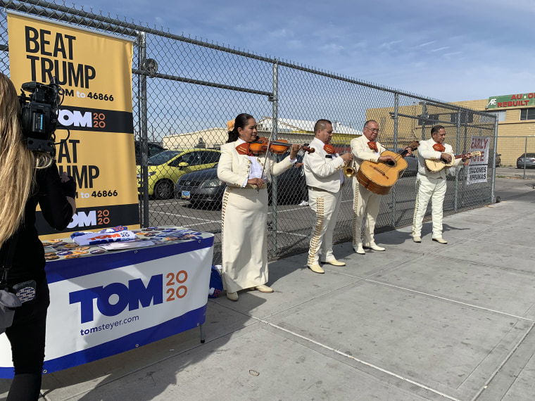 Image: Mariachis hired by the Tom Steyer campaign play outside Culinary Workers Union building on Saturday where early voting was taking place through Tuesday.