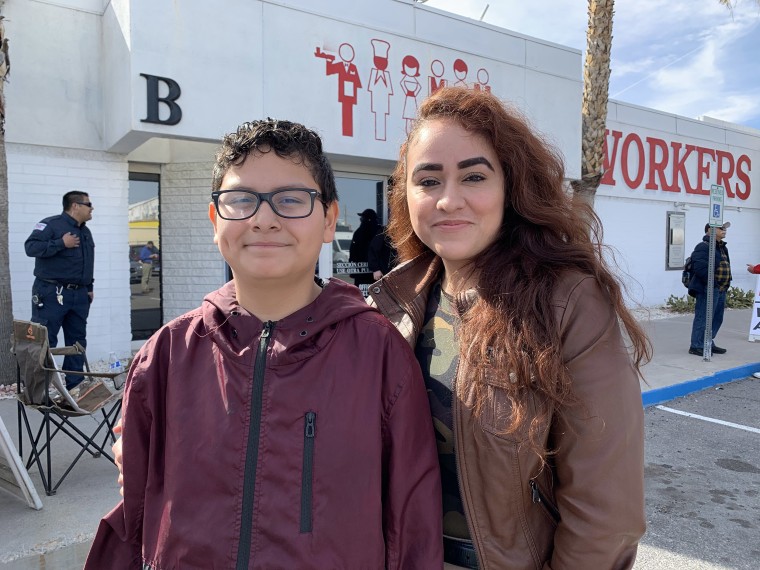 Image: Vicki Loreto-Zaragoza, 31, went to vote early on Saturday, at the Culinary Workers Union building in Las Vegas with her son, Alberto Loreto, 13.