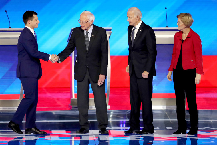 Image: Democratic Presidential Candidates Debate In New Hampshire Ahead Of First Primary Contest