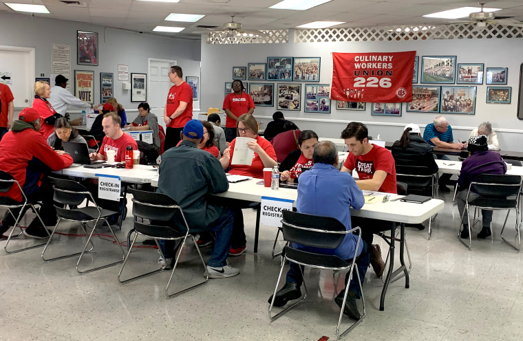 IMAGE: Union members help register voters