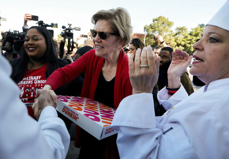 Image: Sen. Elizabeth Warren shakes hands with members of the Culinary Workers Union on their picket line outside of the Palms Casino in Las Vegas on Feb. 19, 2020.