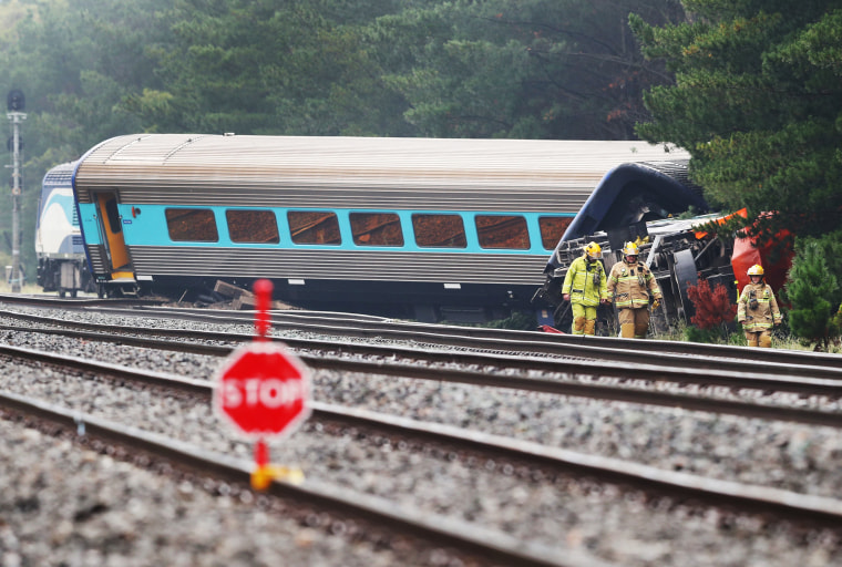 Image: The scene of an XPT train derailment is pictured near Melbourne