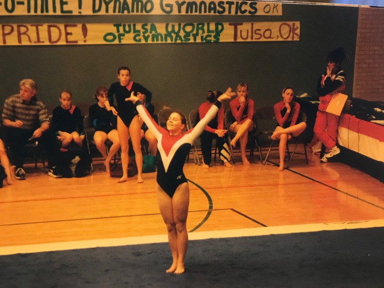 Nicole Clemens competing in gymnastics as a teen. 
