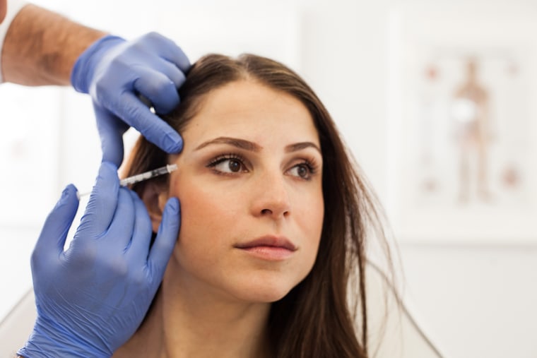 Young Woman at a Cosmetologist's Office