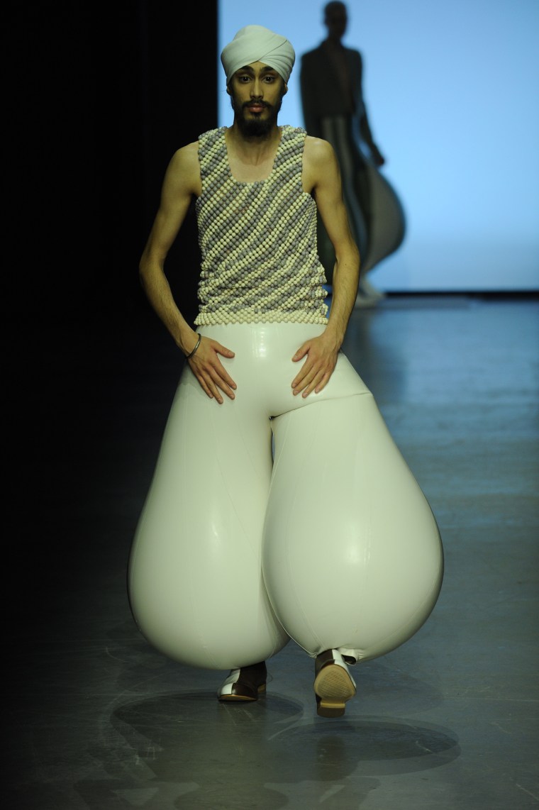 The latex pants are quite literally inflatable.