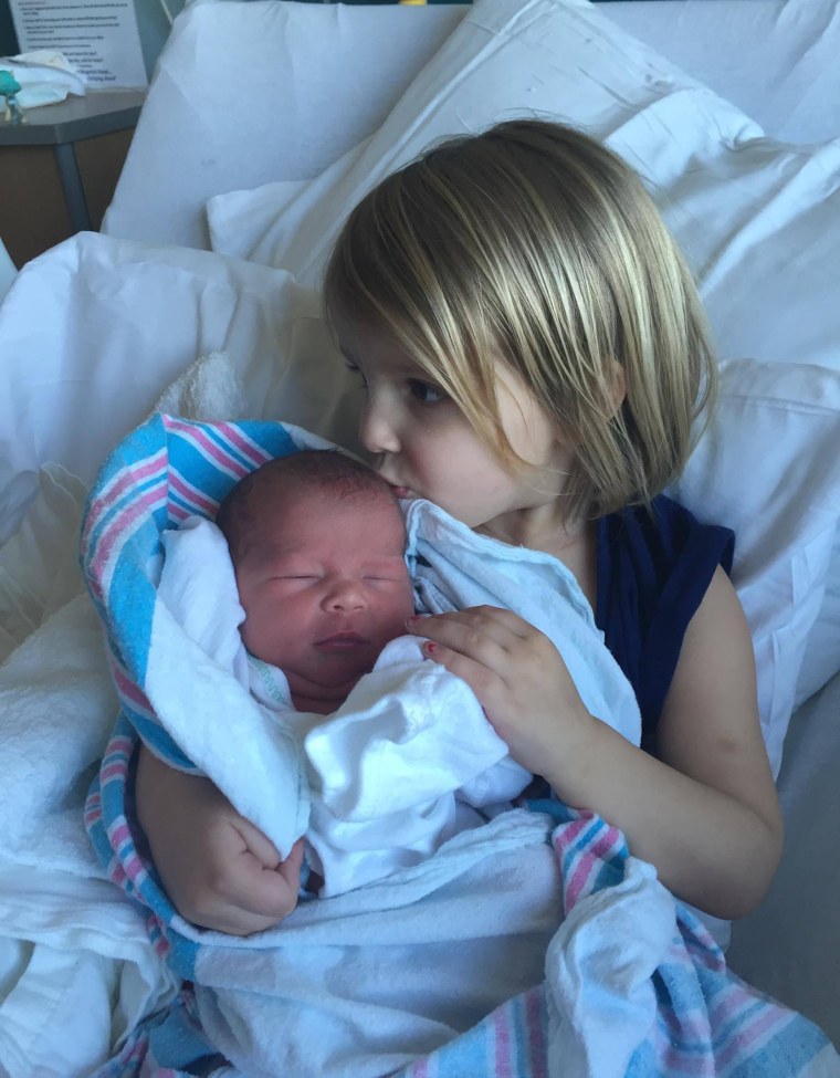 Four-year-old Chloe welcomed baby sister Joelle into the world on Feb. 29, 2016 with a sweet kiss. 