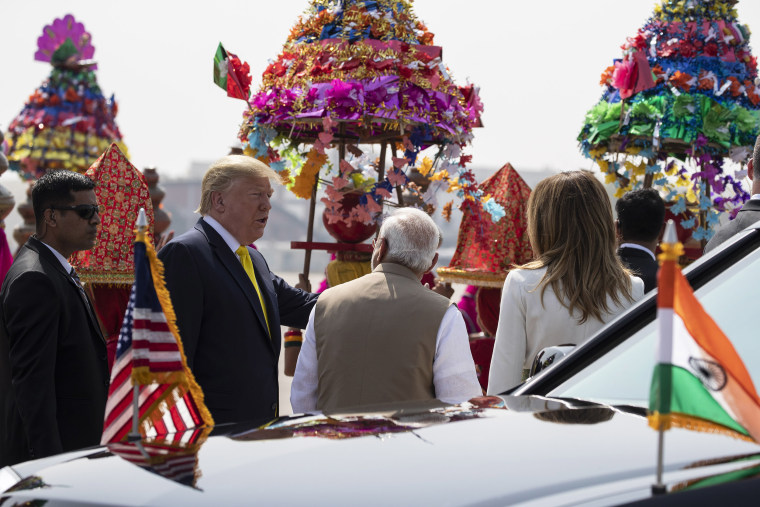 Image: President Donald Trump is greeted by Indian Prime Minister Narendra Modi, with first lady Melania Trump, upon arrival at Sardar Vallabhbhai Patel International Airport