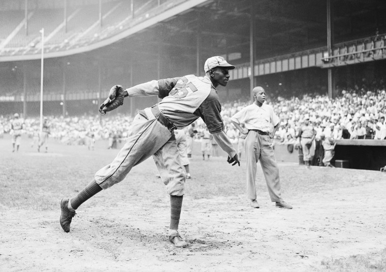 Kansas City Monarchs pitching great Leroy Satchel Paige warms up at New York's Yankee Stadium Aug. 2, 1942 for a Negro League game between the Monarchs and the New York Cuban Stars.