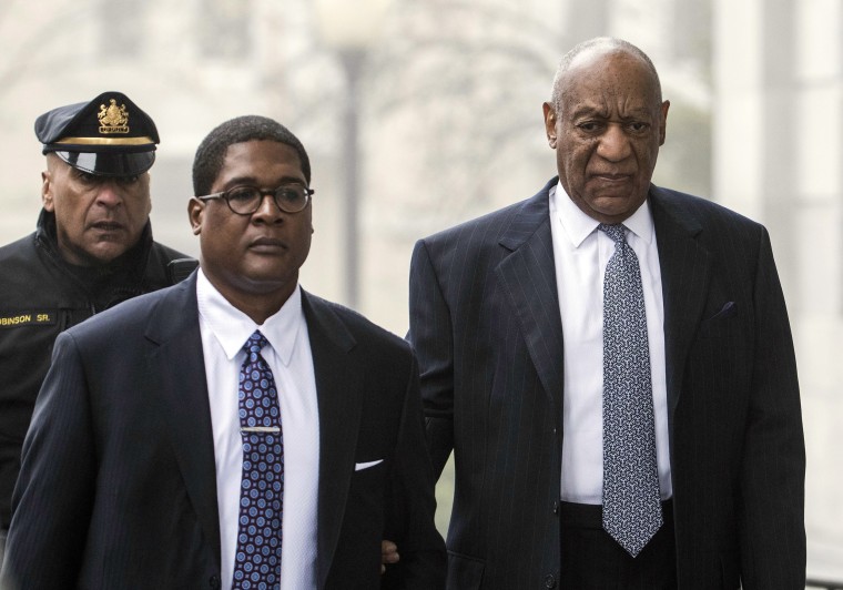 Image: Bill Cosby, right, arrives for his sexual assault case spokesperson Andrew Wyatt, center, at the Montgomery County Courthouse