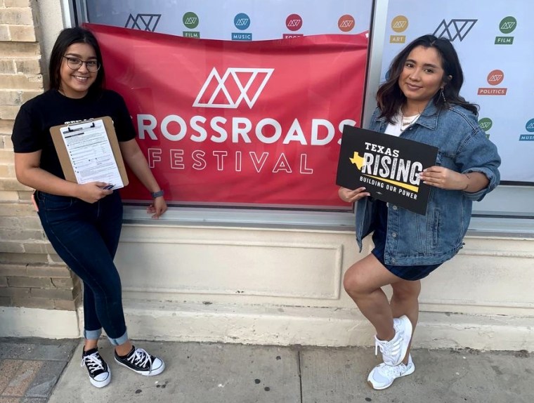 Image: Ofelia Alonso, right, at a voter registration event in Texas.