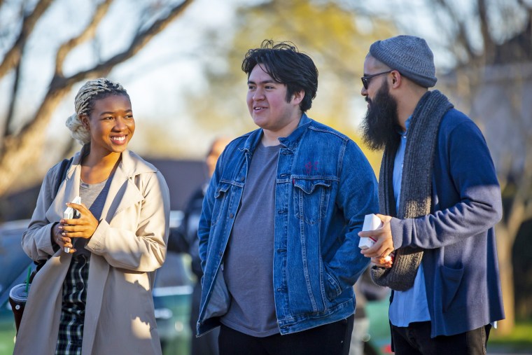 Campaign manager Jacob Castillo, center, campaigns with Stevens Orozco in Houston.