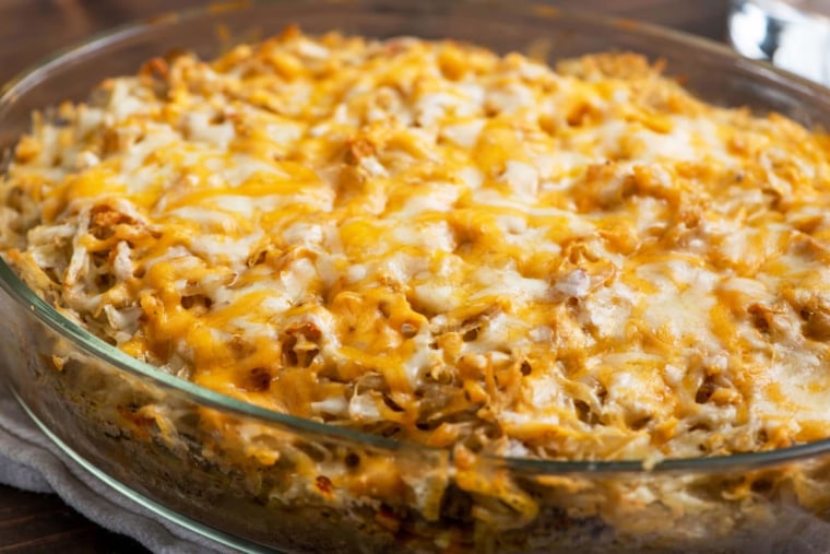 Crispy, but tender, shredded potatoes top a casserole of juicy ground beef and get a sprinkle of cheddar cheese.