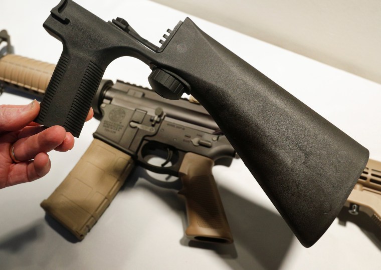 Image: A bump fire stock that attaches to an semi-automatic assault rifle to increase the firing rate is seen at Good Guys Gun Shop in Orem