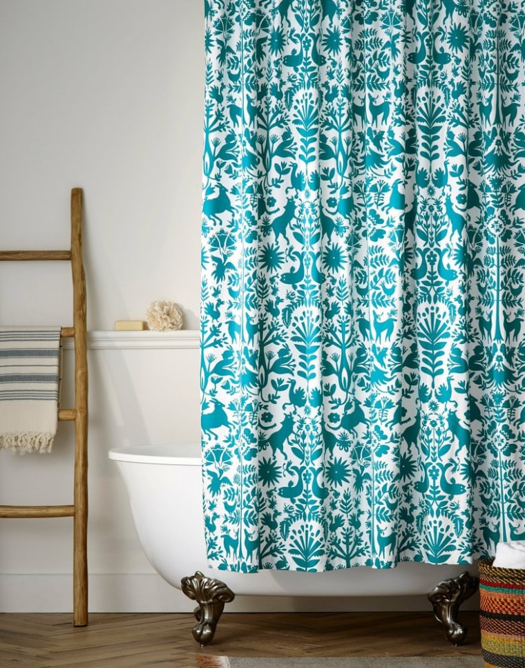 This Hygge & West Otomi shower curtain brings to color to the bathroom.
