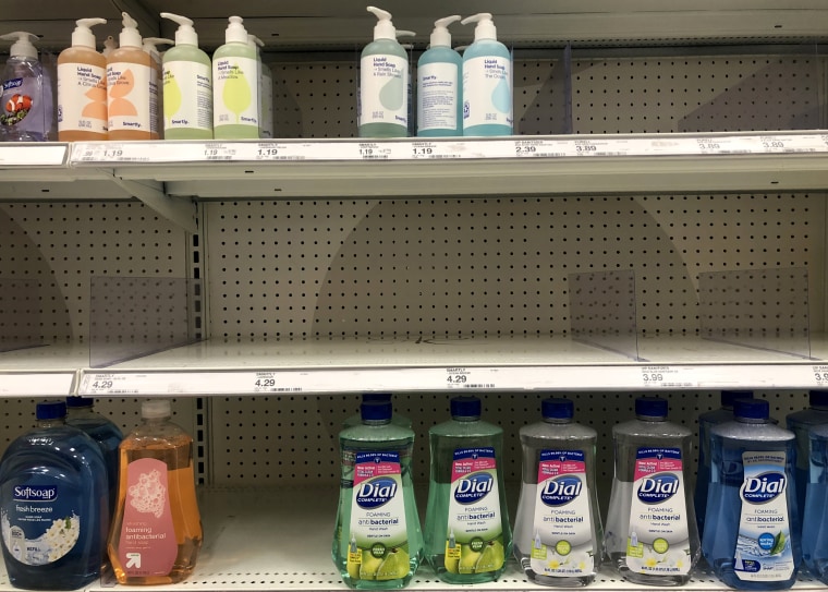 IMage: Empty shelves that once held soap at a Target store in San Rafael, Calif., on March 2, 2020.