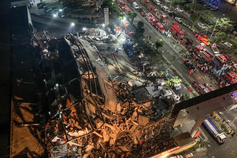 Image: TOPSHOT-CHINA-ACCIDENT-HOTEL