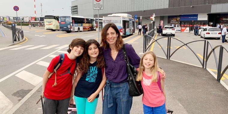Cristina Higgins with her three children on family trip last summer.