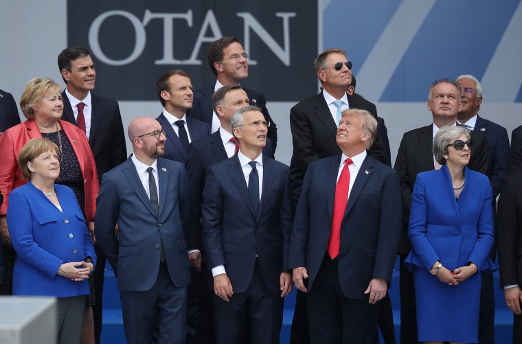 Image: President Donald Trump stands with the leaders of other NATO nations