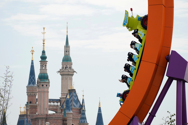 Image: FILE PHOTO: People visit the opening event of Disney-Pixar Toy Story Land, the seventh themed land in Shanghai Disneyland in Shanghai