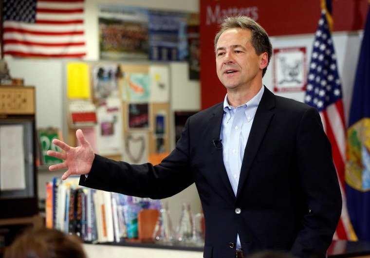 Image: Montana Governor Steve Bullock talks to the media and students at Helena High School as he launches 2020 U.S. presidential campaign in Helena, Montana
