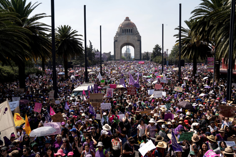 Image: Demonstrators march in Mexico City on International Women's Day on March 8, 2020.
