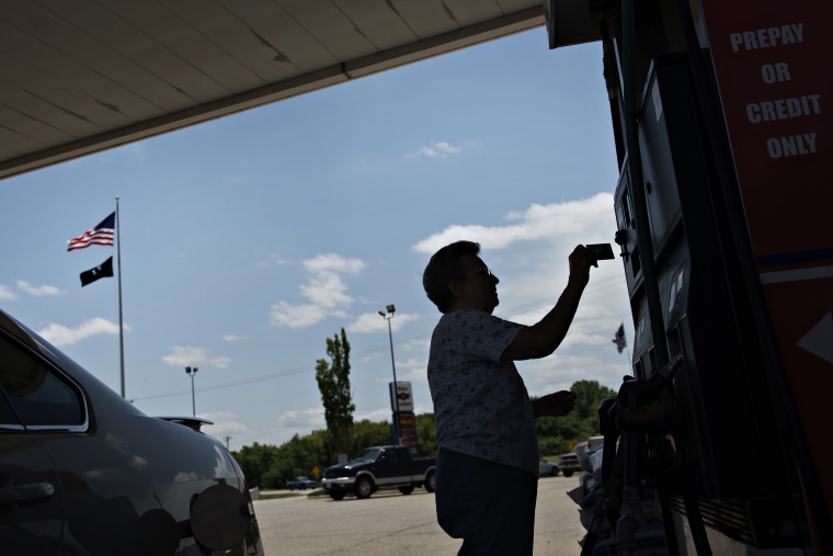 A customer pays for gas in Princeton, Ill.