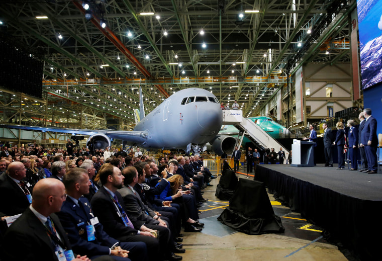 U.S. Air Force and Boeing dignitaries gather during a delivery celebration of the Boeing KC-46 Pegasus aerial refueling tanker to the U.S. Air Force in Everett, Washington