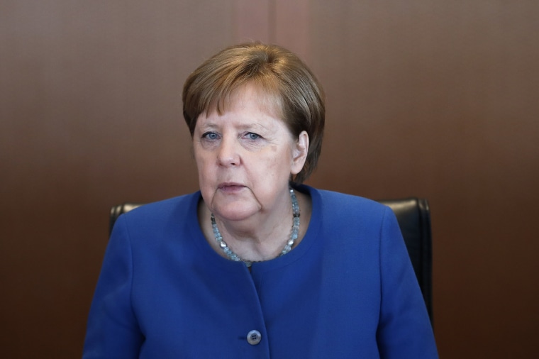 Image: German Chancellor Angela Merkel leads the weekly cabinet meeting 