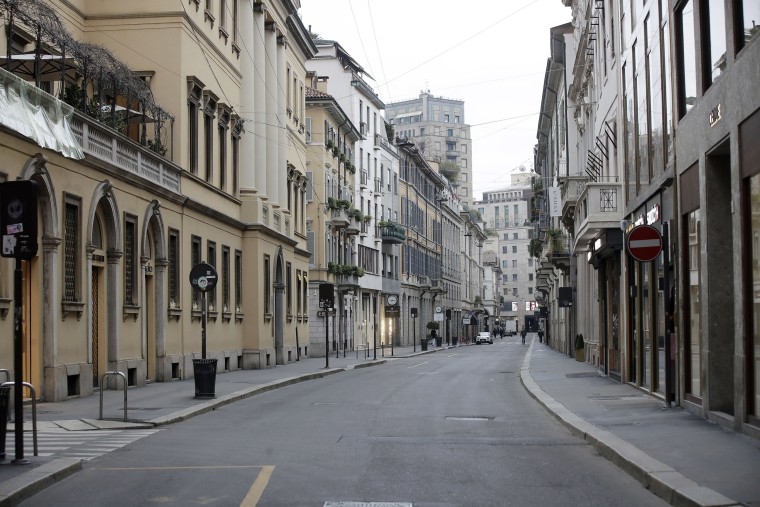 Image: A deserted street in downtown Milan, Italy, Thursday, March 12, 2020