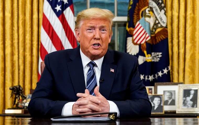 Image: President Trump speaks about the U.S response to the COVID-19 coronavirus pandemic during an address to the nation from the Oval Office of the White House