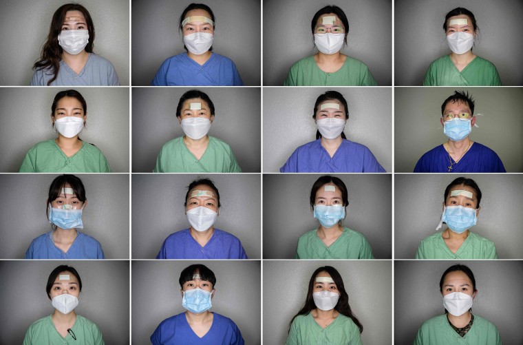 Image: Nurses from Keimyung University hospital posing for portraits between shifts caring for patients infected with the COVID-19 novel coronavirus in Daegu, South Koea