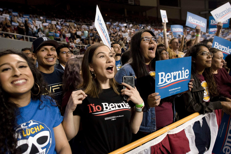 Image: A supporter wears a shirt that says "Tio Bernie" during a rally for Sen. Bernie Sanders in Phoenix, Ariz., on March 5, 2020.