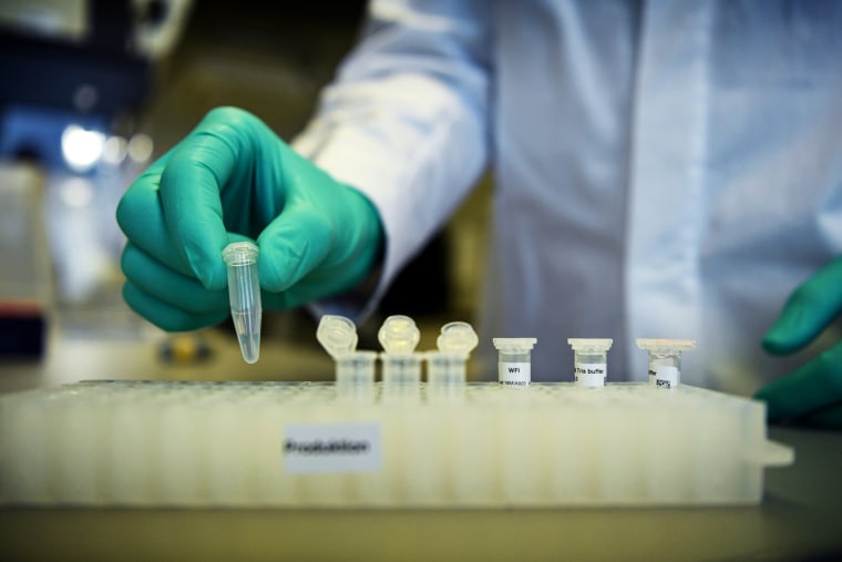 Image: A biopharmaceutical employee at CureVac demonstrates research for a coronavirus vaccine at a lab in Tuebingen, Germany, on March 12, 2020.