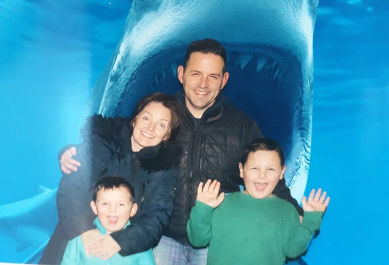 Kathy Bergin with her husband, Dan, and her sons, Kieran, 8, and Kai, 6.