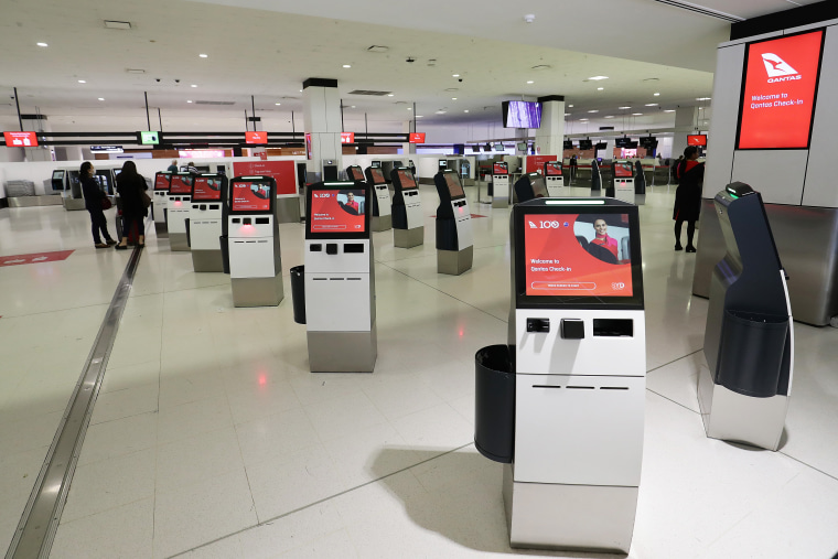 Image: The Qantas check in at an empty Sydney International Airport on Thursday.