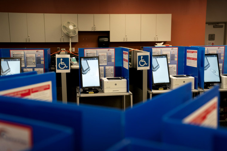 Image: Wheelchair-accessible voting machines at a polling station in Chula Vista, Calif., on March 3, 2020.