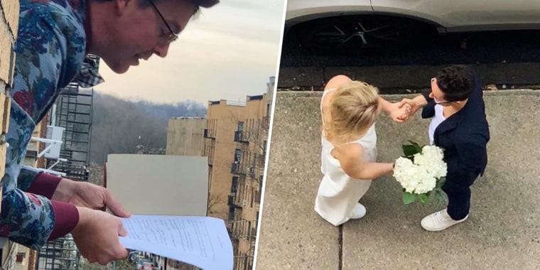 Image: Matt Wilson, left, officiates Reilly Jenning's and Amanda Wheeler's wedding from his fourth floor apartment window in New York.