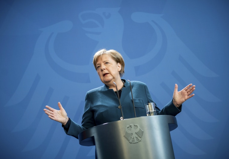 Image: German Chancellor Angela Merkel speaks at a press conference in Berlin on March 22, 2020.